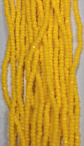 Size 13/0 Charlotte cut seed beads Corn Yellow op full hank
