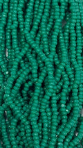 Size 13/0 Charlotte cut seed beads . Jade Green OP full hank