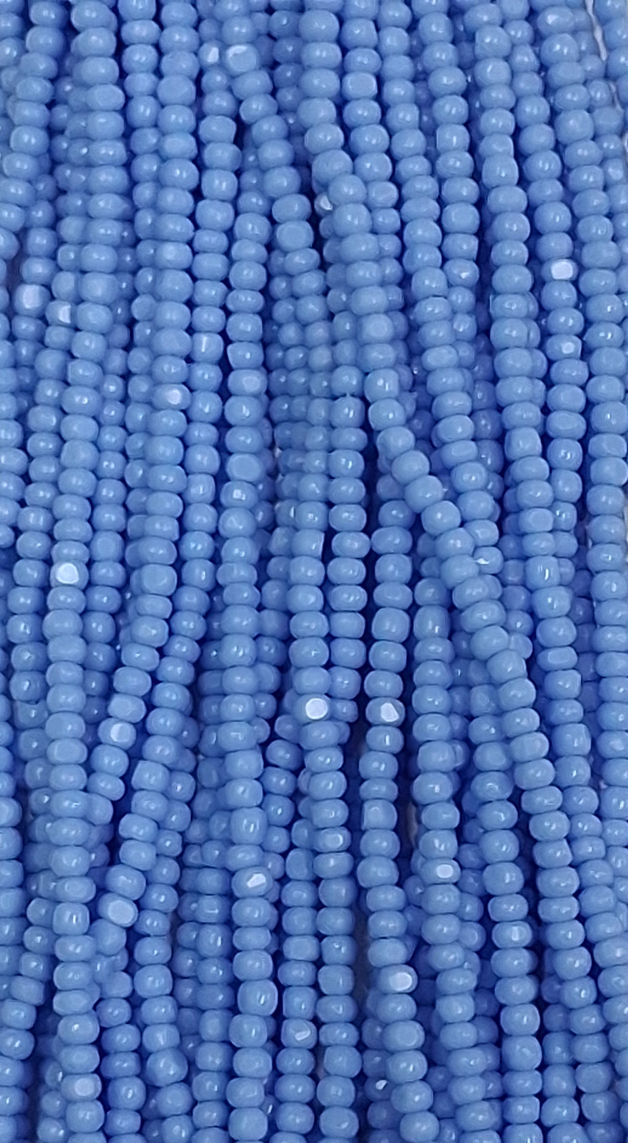 Size 13/0 Charlotte cut seed beads . Periwinkle Blue  OP full hank
