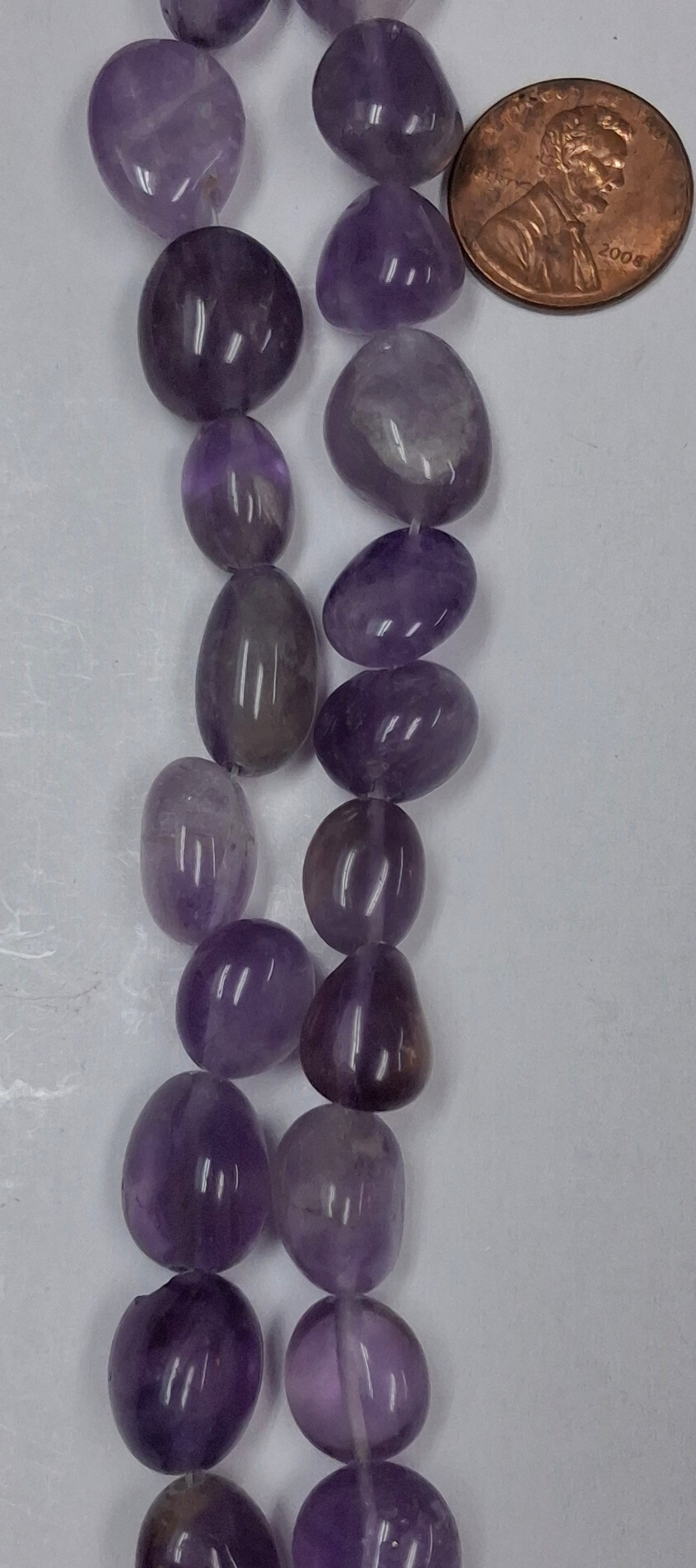 Amethyst Nuggets 16 x 12 mm   7.5 inch strand