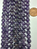 Amethyst 8 mm round  beads   7.5 inch strand