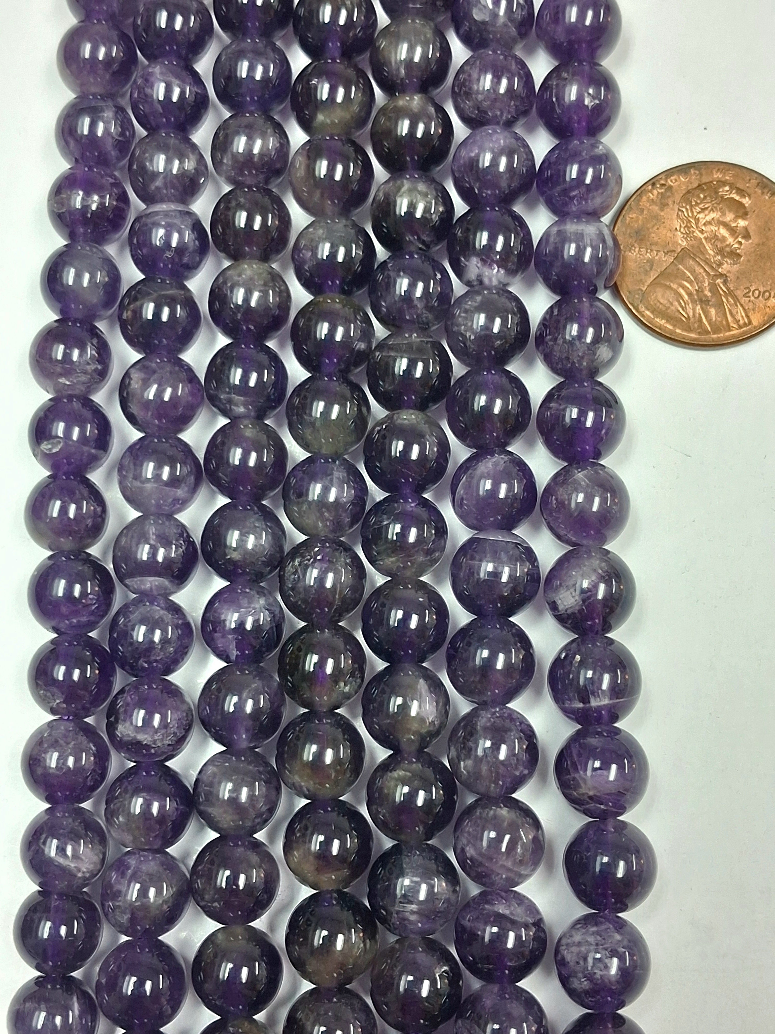 Amethyst 8 mm round  beads   7.5 inch strand