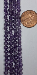 Amethyst 4 mm round  beads   8 inch strand