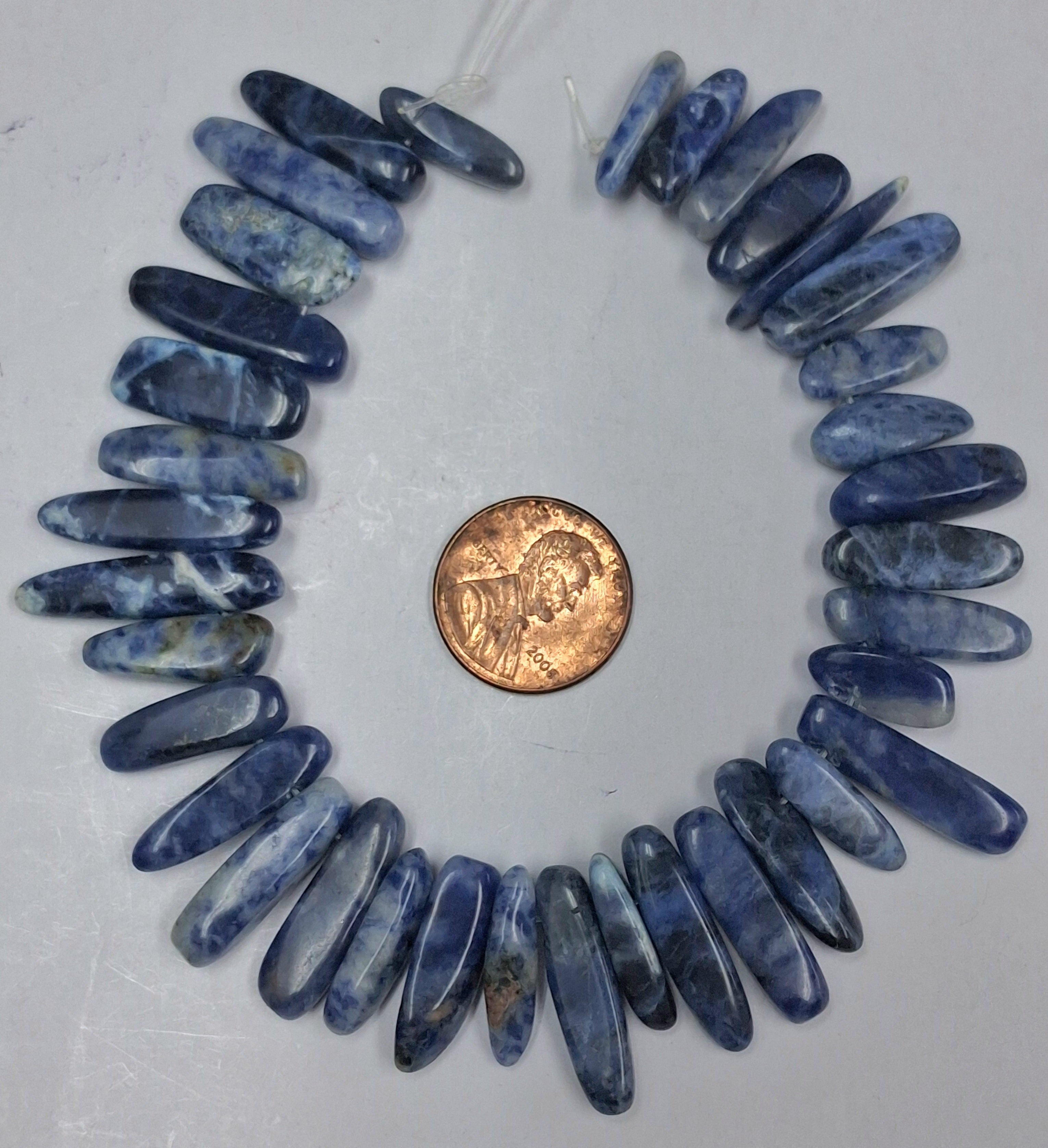 Sodalite stick chip 8 inch strand