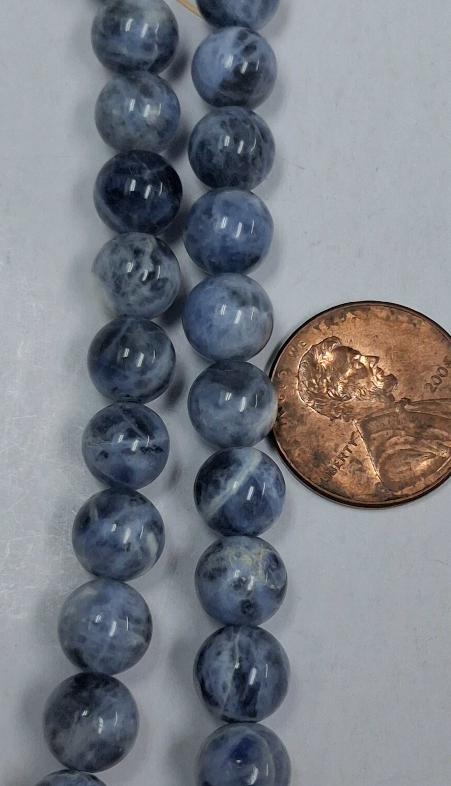 Sodalite   8 mm round beads   8  inch strand
