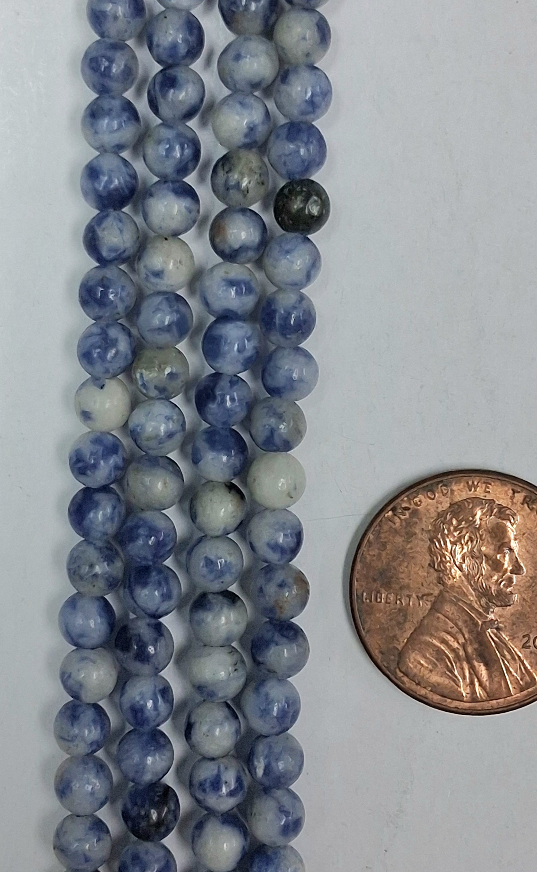 Dumortierite 4mm round beads 8 inch strand