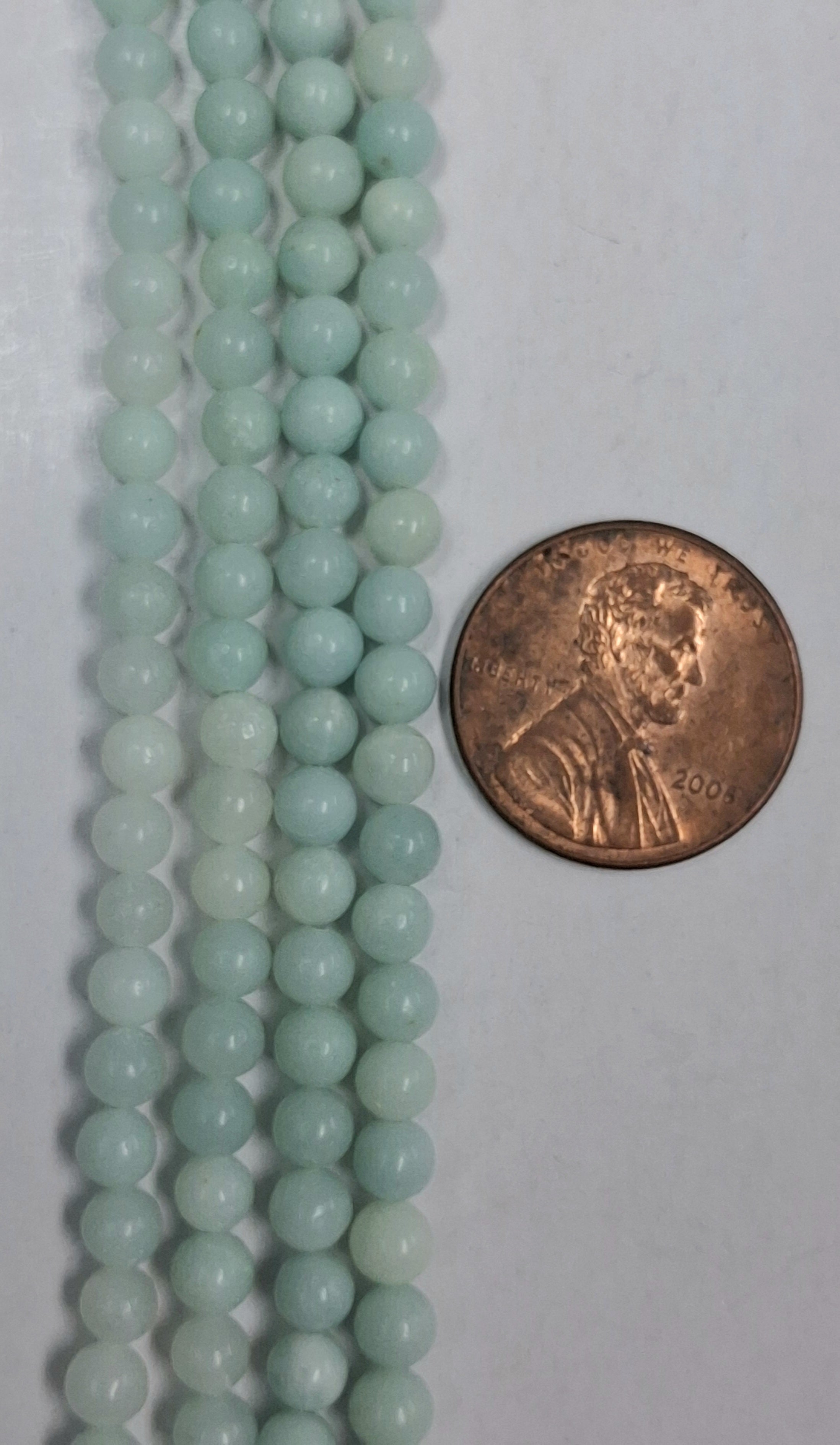 Amazonite 4mm round beads   8 inch strand