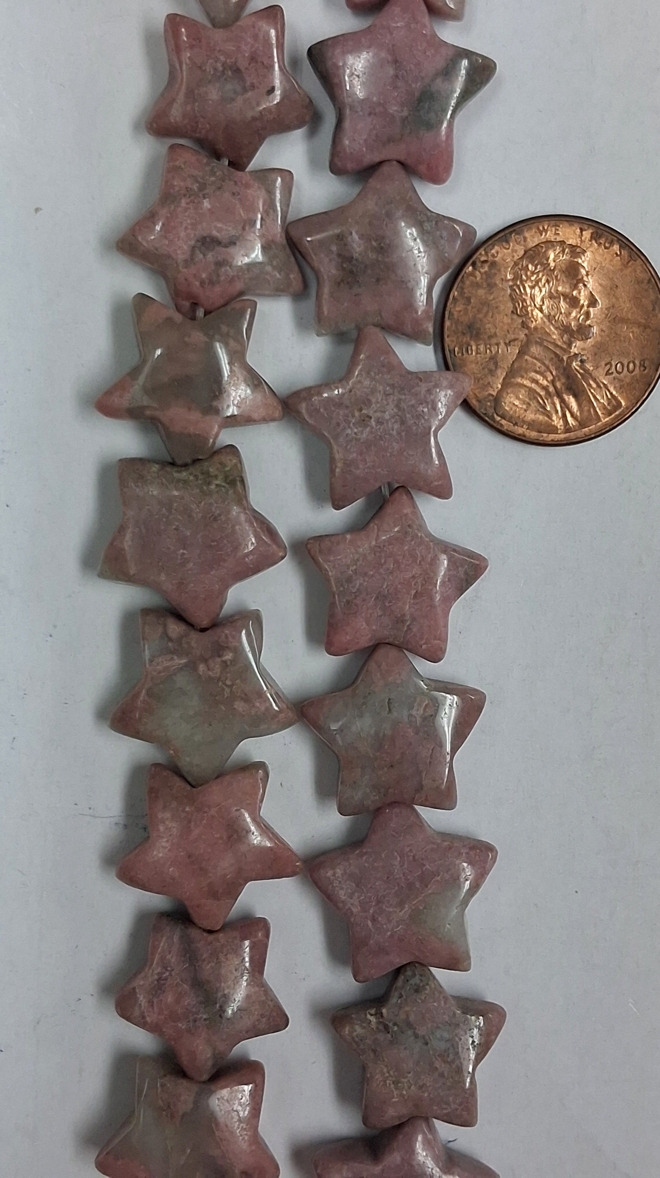 Rhodonite   Stars 15 mm    8 inch strand