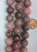 Rhodonite   16 mm round beads     8 inch strand