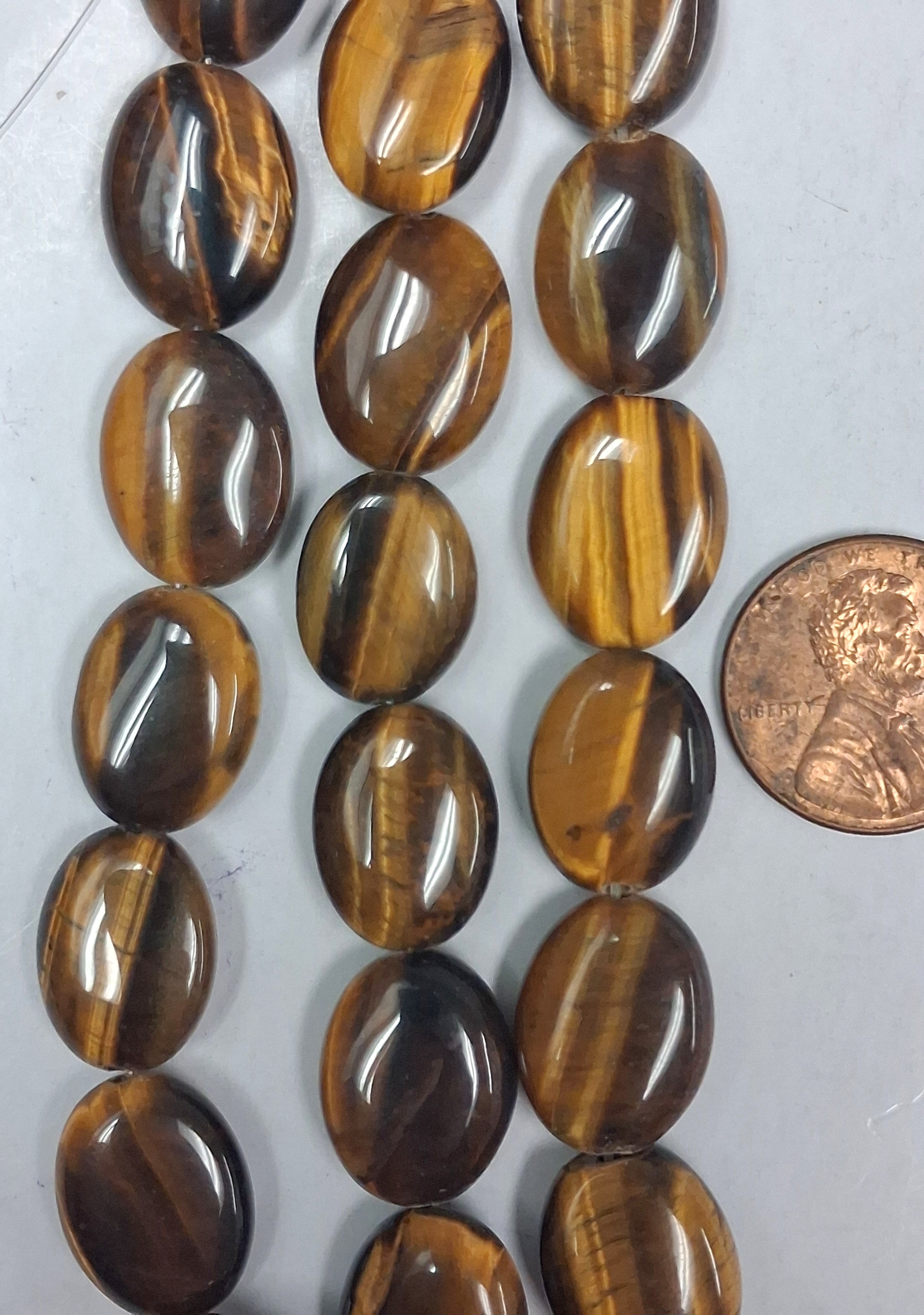 Tiger Eye   A+  Oval 12 x16mm   7.5 inch strand