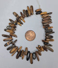 Tiger Eye   Stick Chip   8 inch strand