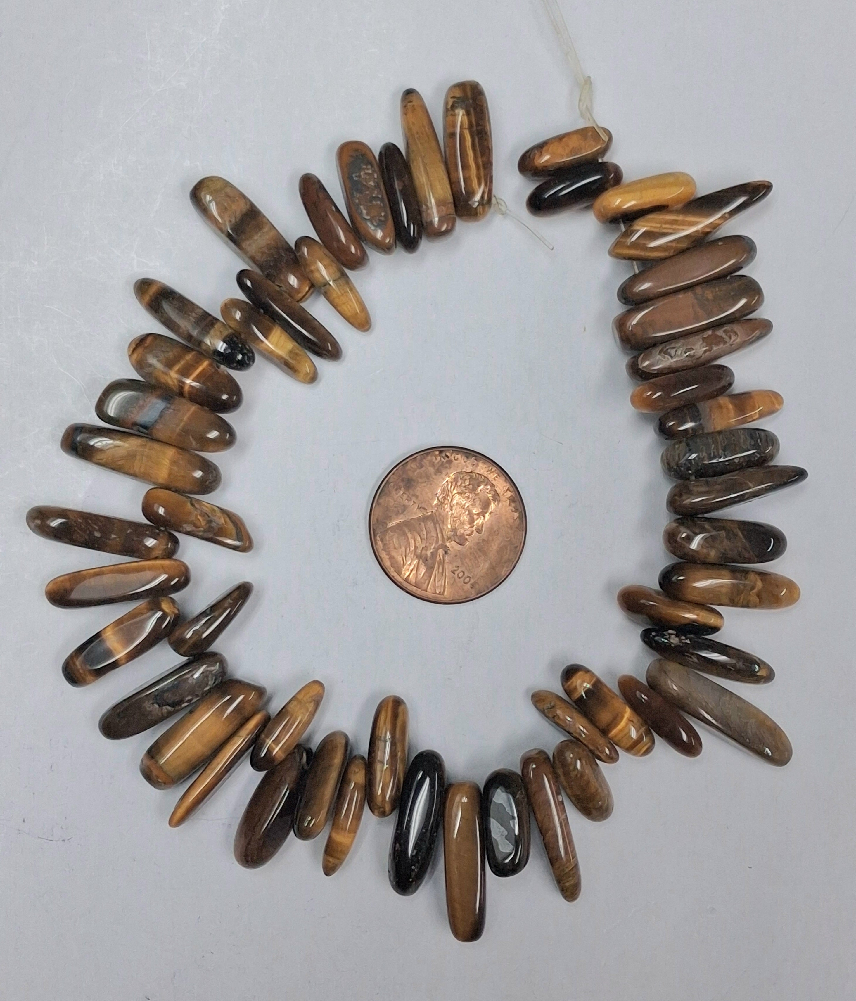 Tiger Eye   Stick Chip   8 inch strand