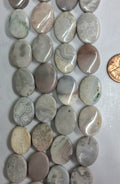 Ocean Jasper wavy Oval 13x 18 mm   8 inch strand