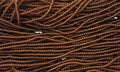 11/0 CZECH MED TOPAZ TR SEED BEADS 12 STRING/HNK-APPX 17 GMS