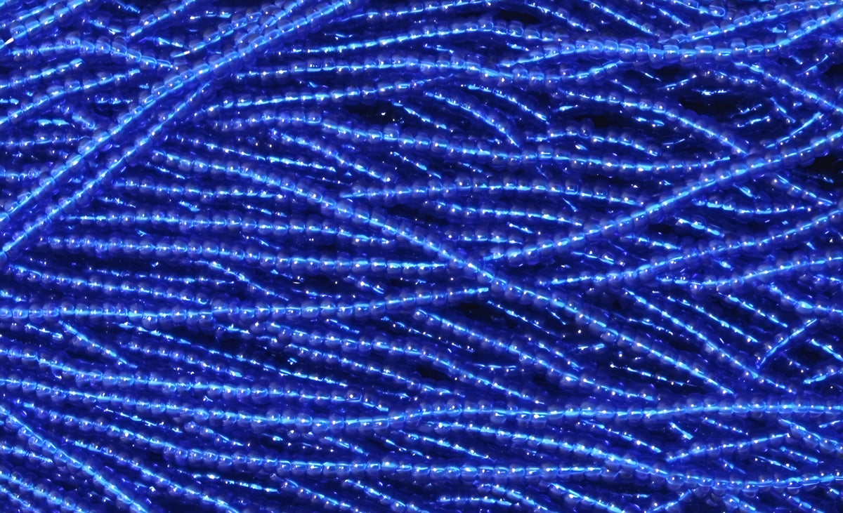 11/0 CZECH CAPRI BLUE TR SEED BEADS 12 STRING/HNK-APPX 17 GMS
