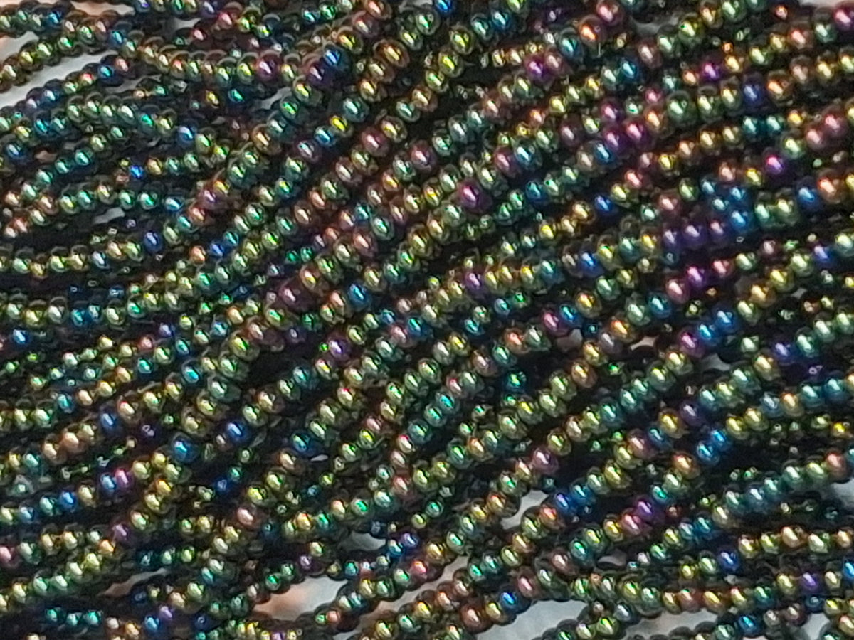 11/0 CZECH GREEN IRIS SEED BEADS  12 STRING/HNK-APPX 34 GMS