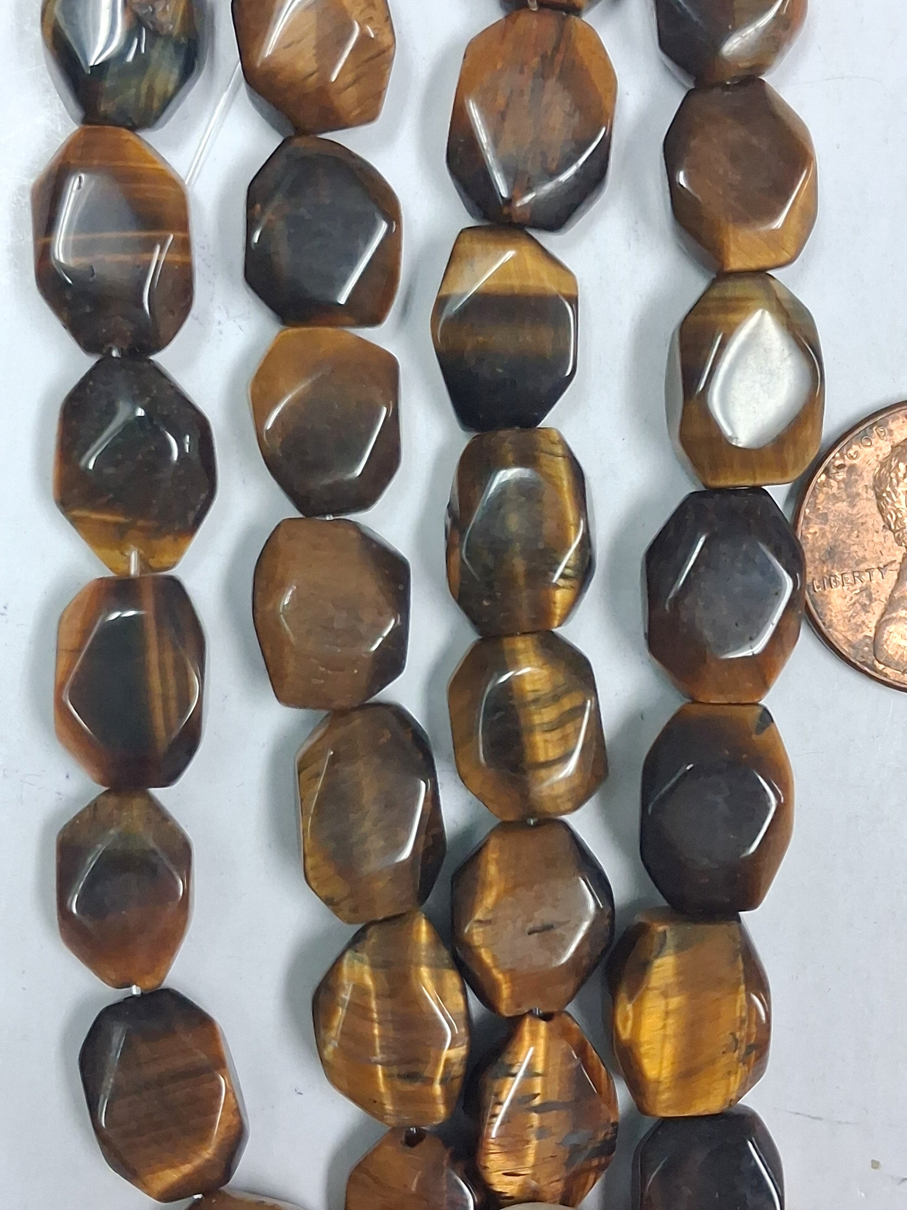 Tiger Eye   A+ Faceted Nugget   10x14 mm   7.5 inch strand