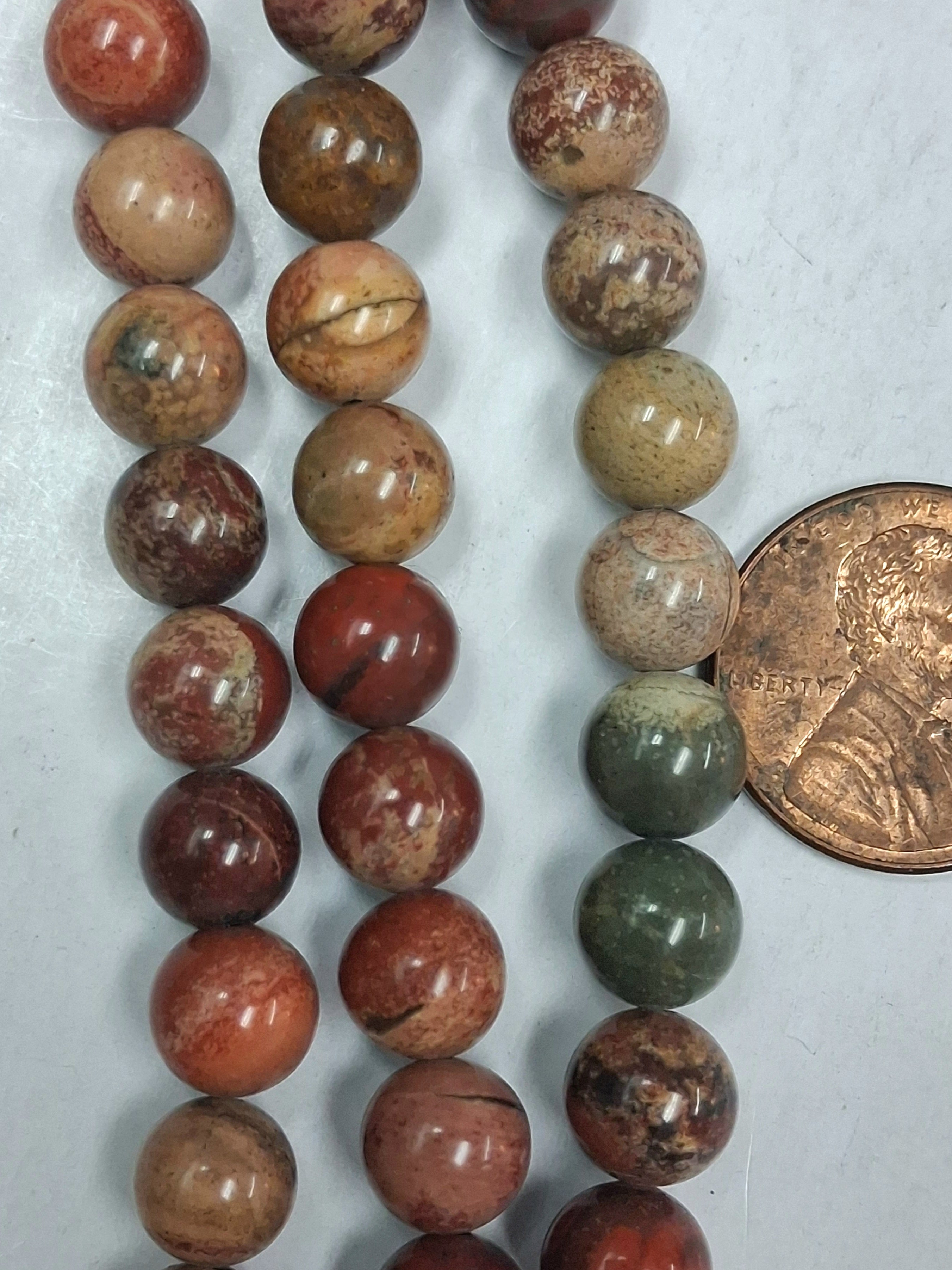 Natural Red Poppy Jasper   8 mm Round beads    7..5 inch strand