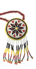 2 1/4" Beaded Star Medallion Necklace w/ 27" beaded chain and 2 1/4" fringe. Leather backing. Red, white, black, yellow
