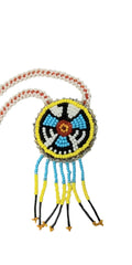1 3/4" Beaded Thunderbird Medallion Necklace w/ 29" beaded chain and 1 1/2" fringe. Leather backing. Turquoise, yellow, orange