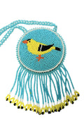 3 1/4" Beaded Bird Medallion Necklace w/ 27.5" beaded chain and 2" fringe. Leather backing. Turquoise, yellow