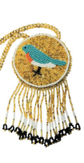 3 1/4" Beaded Blue Bird Medallion Necklace w/ 29" beaded chain and 2.5" fringe. Leather backing. Turquoise, beige, black