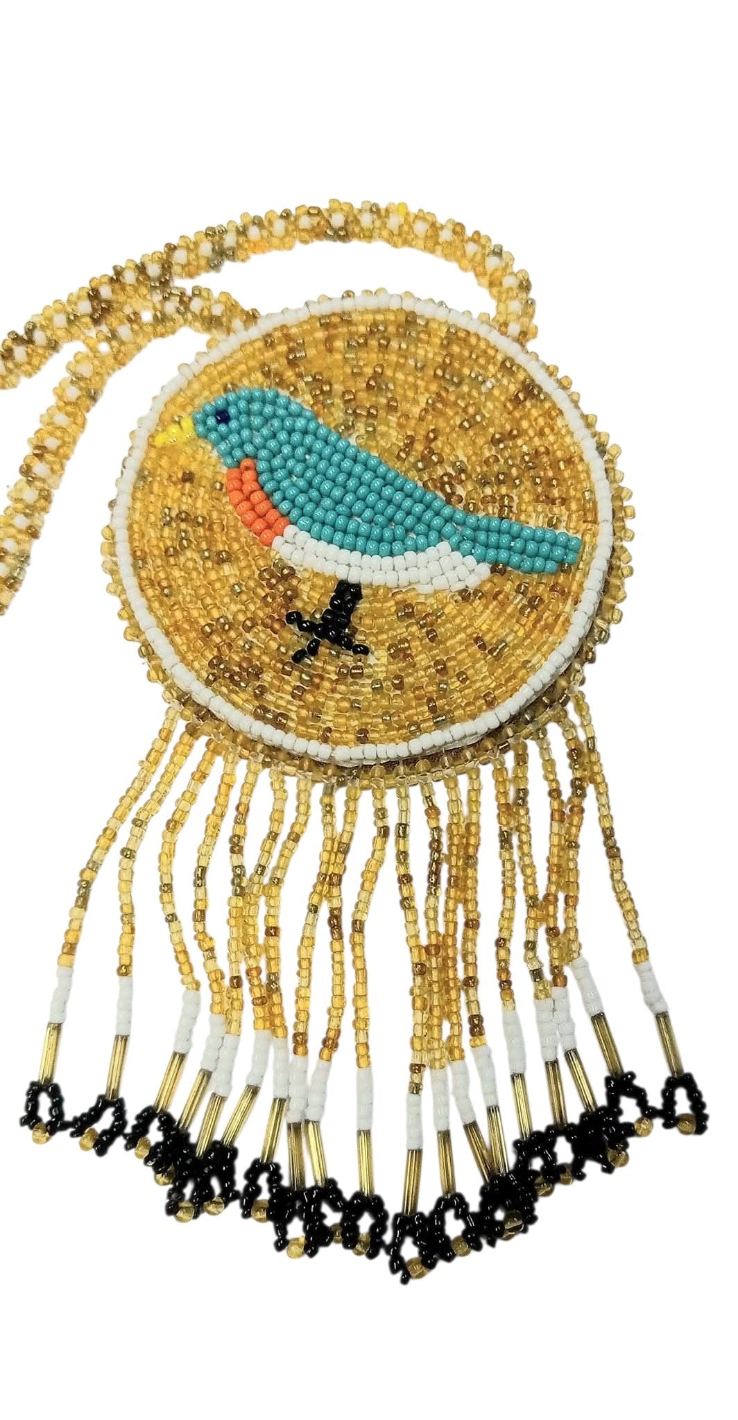 3 1/4" Beaded Blue Bird Medallion Necklace w/ 29" beaded chain and 2.5" fringe. Leather backing. Turquoise, beige, black