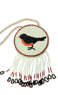 3 1/4" Beaded Robin Bird Medallion Necklace w/ 29" beaded chain and 2.5" fringe. Leather backing. White, black, red