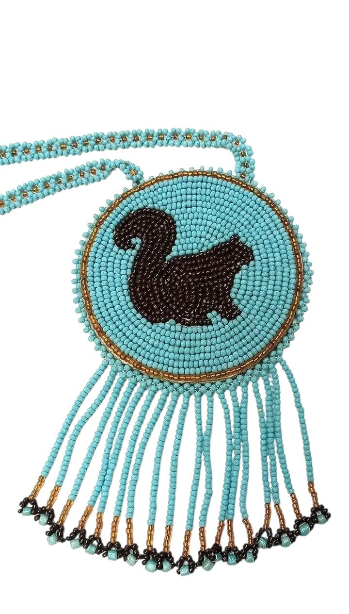 3 1/4" Beaded Squirrel Medallion Necklace w/  28" beaded chain and 2 1/4" fringe. Leather backing. Turquoise, orange, brown