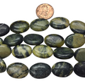 Yellow turquoise Puffy Oval 15x2 beads 8 inch strand