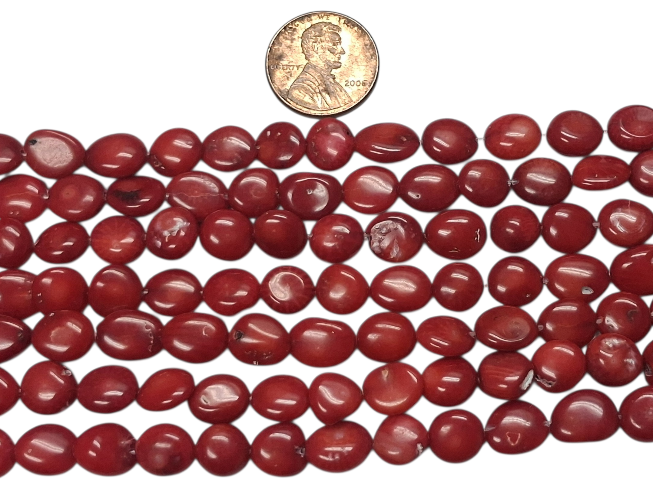 Red Coral Puff Oval 6-8 mm 8 inch Strand