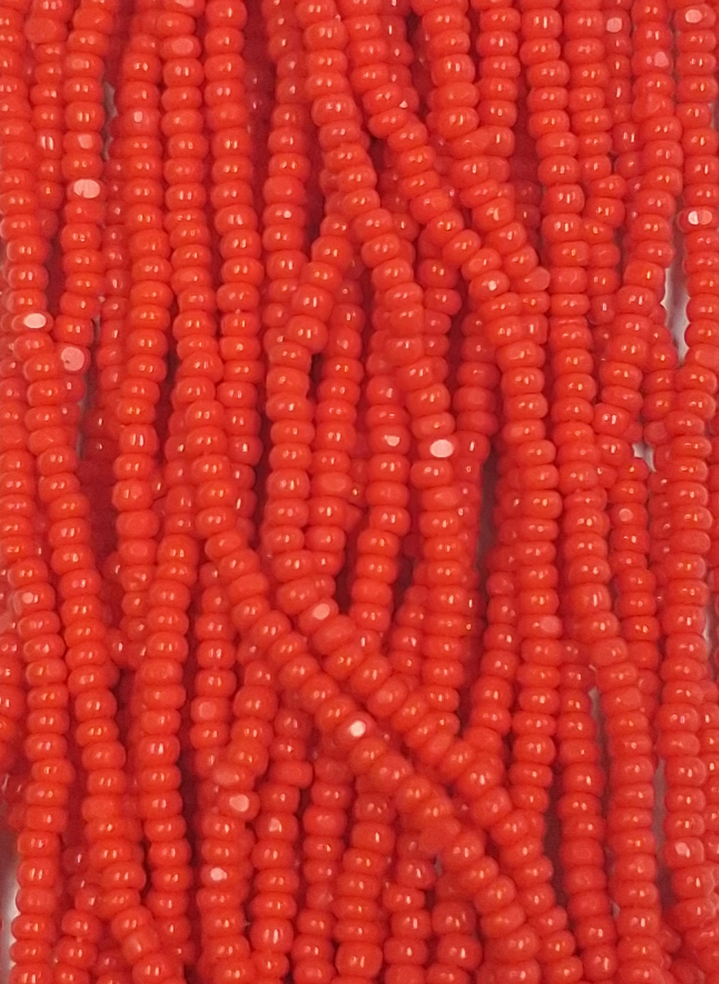Size 13/0 Charlotte cut seed beads Red Orange op full hank