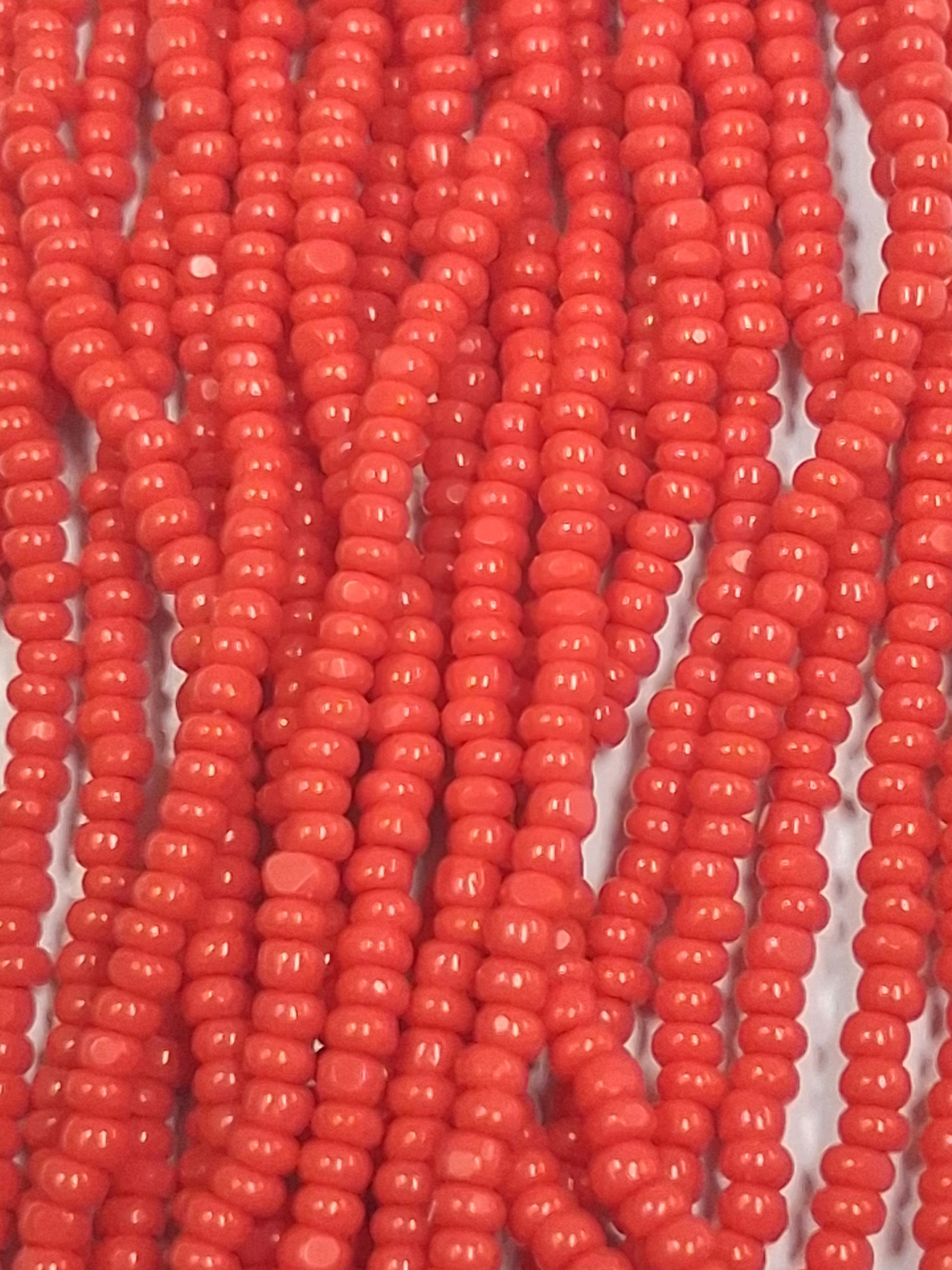 Size 13/0 Charlotte cut seed beads Lt. Red op full hank