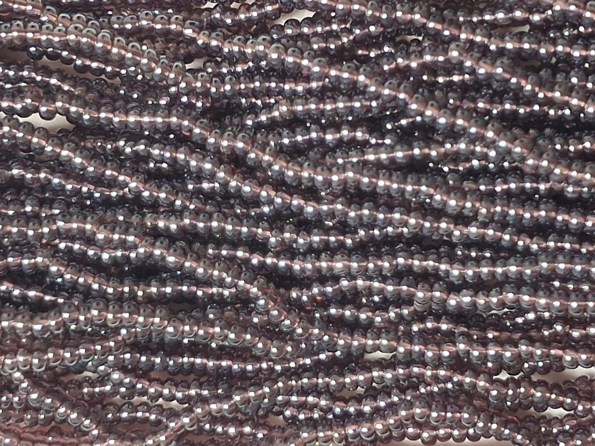 11/0 CZECH DK AMETHYST TR LUSTER SEED BEADS 12 STRING/HNK-APPX 34 GMS