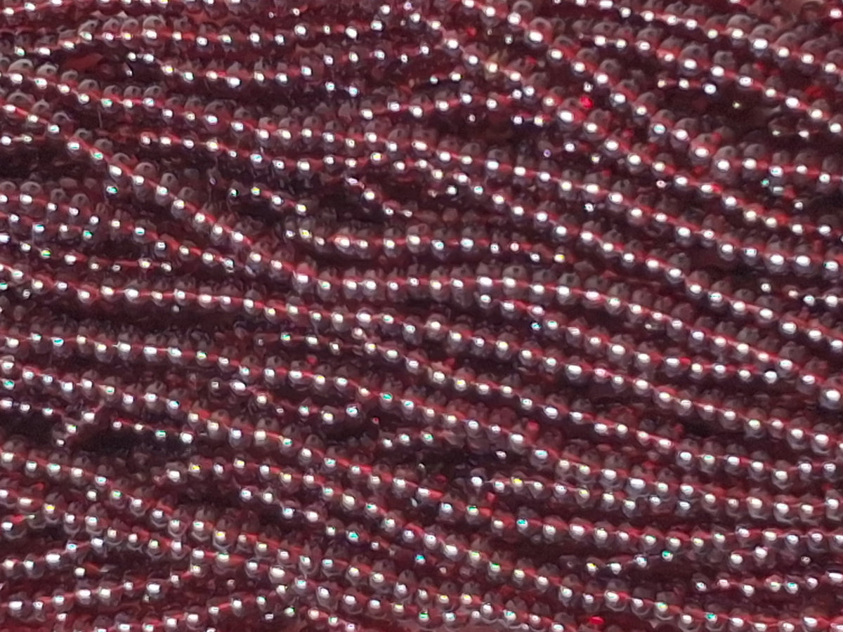 11/0 CZECH DK RUBY RED TR LUSTER SEED BEADS 12 STRING/HNK-APPX 34 GMS