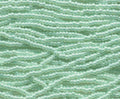 11/0 CZECH LT GREEN CEYLON 12 STRING/HNK-APPX 34 GMS