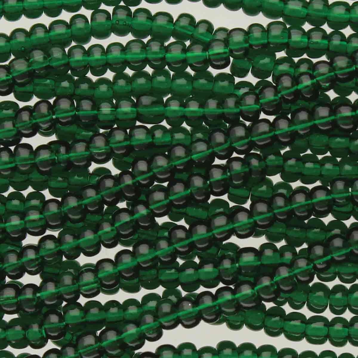 11/0 CZECH DK. GREEN TRANS -12 STRING/HNK-APPX 18 GMS
