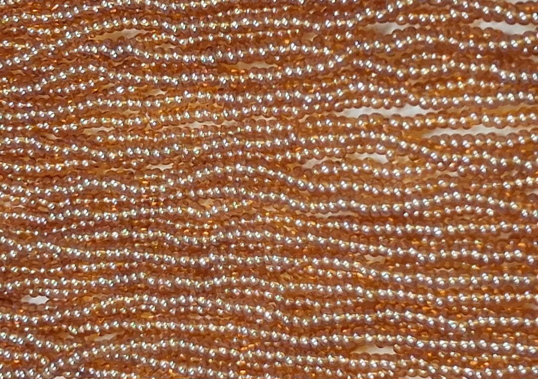 11/0 CZECH TOPAZ TR AB SEED BEADS 12 STRING/HNK-APPX 17 GMS