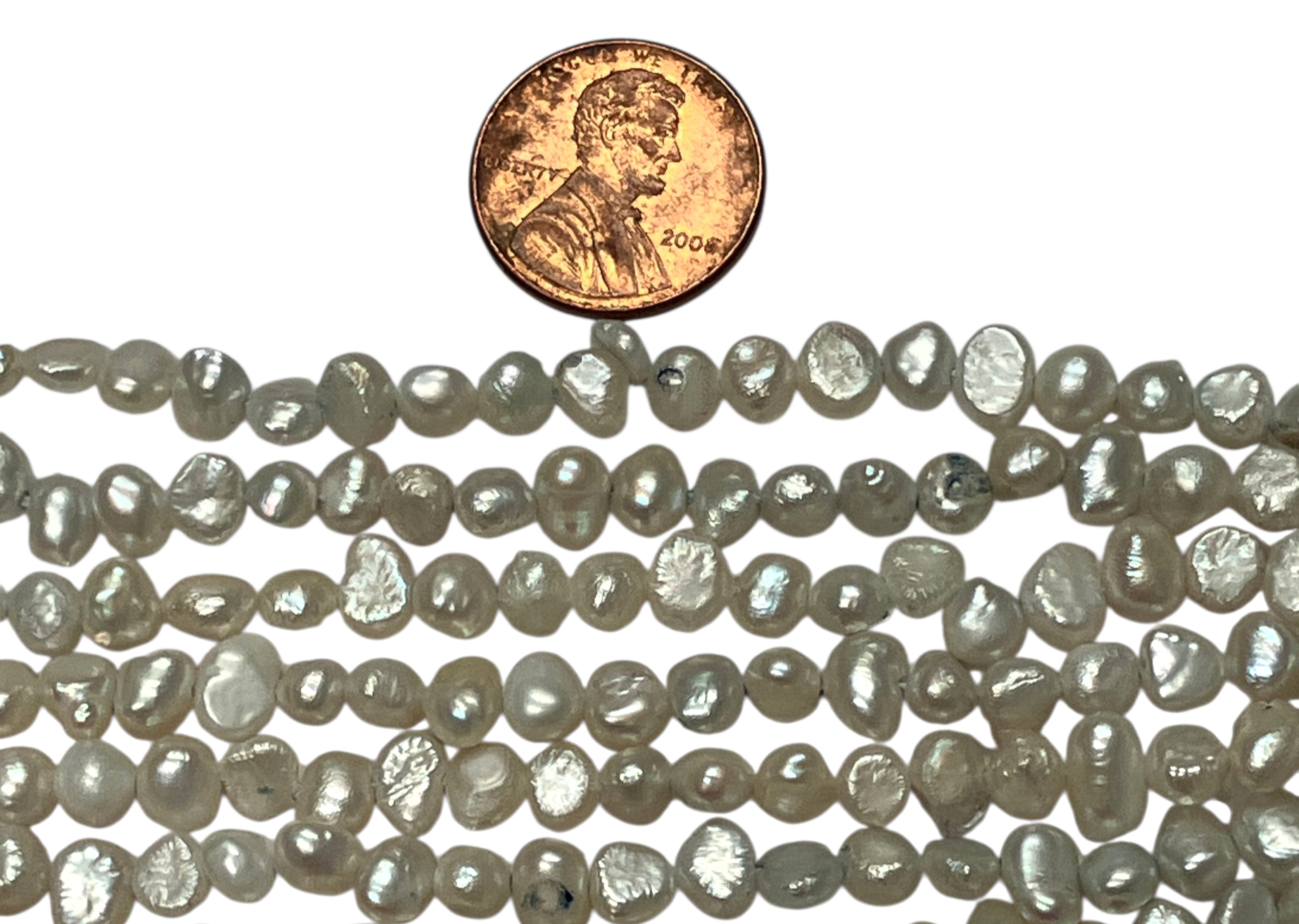 Lt Blue Fresh Water pearl nuggets  3-4 mm B Grade 14.5 inch strand