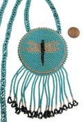 3" Beaded Dragonfly Medallion Necklace w/ 30" chain  and 2 1/4" fringe. Leather backing. Turquoise