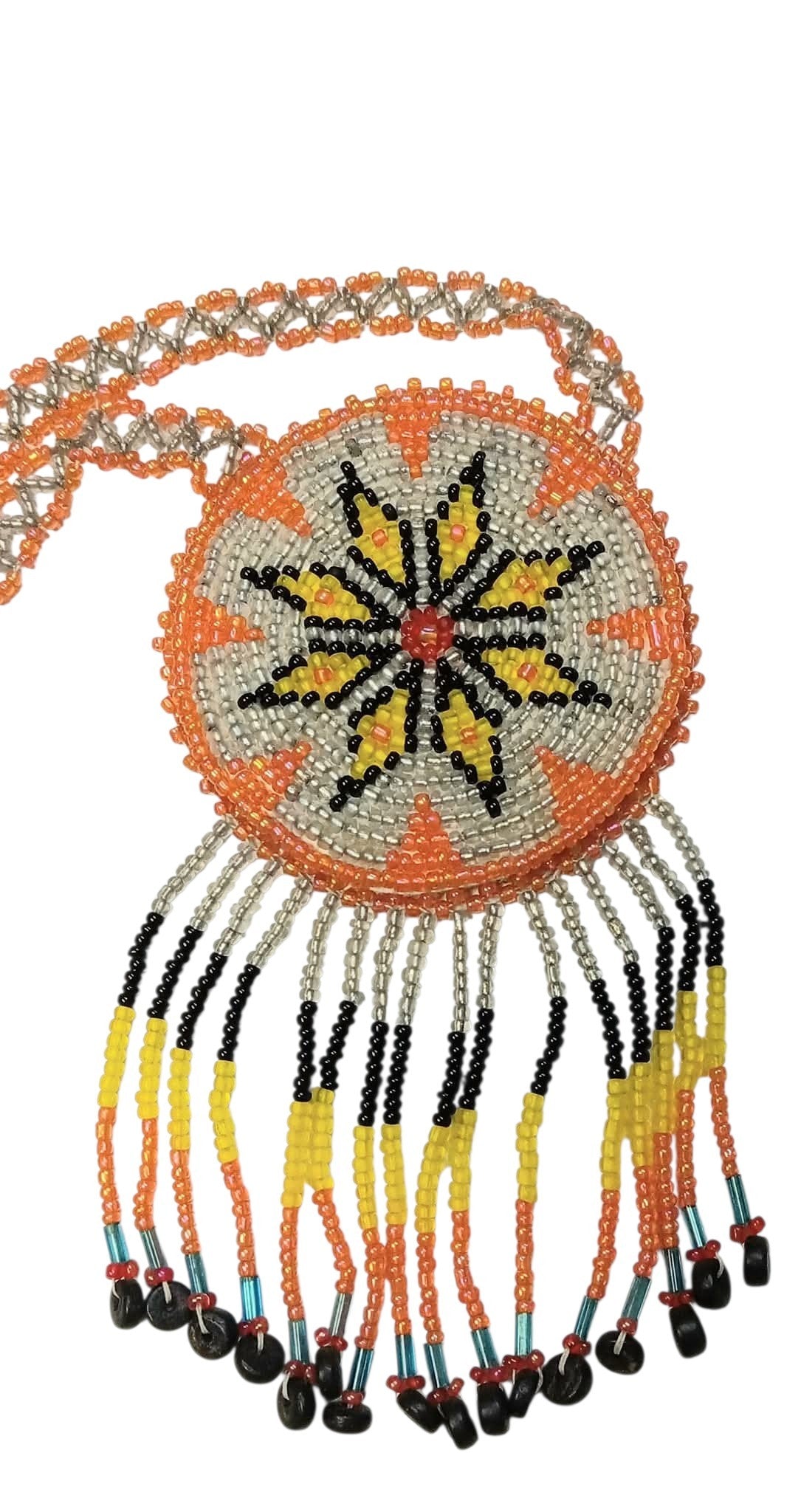 2 1/2" Beaded Star Medallion Necklace w/ 28" beaded chain and 2.5" fringe. Leather backing. Orange, silver