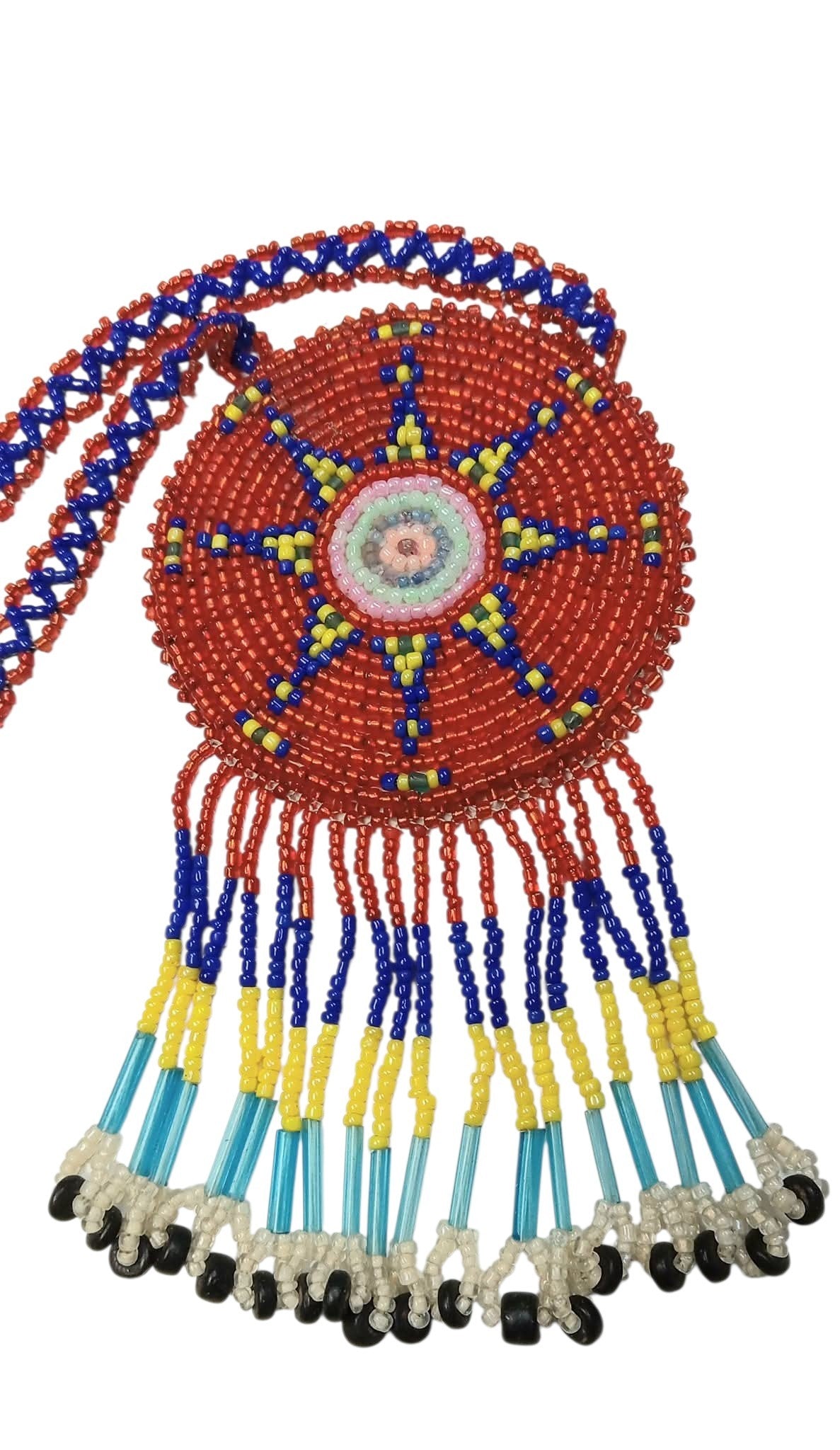 2 3/4" Beaded Star Medallion Necklace w/ 28.5" beaded chain and 2.5" fringe. Leather backing. Red, blue, yellow